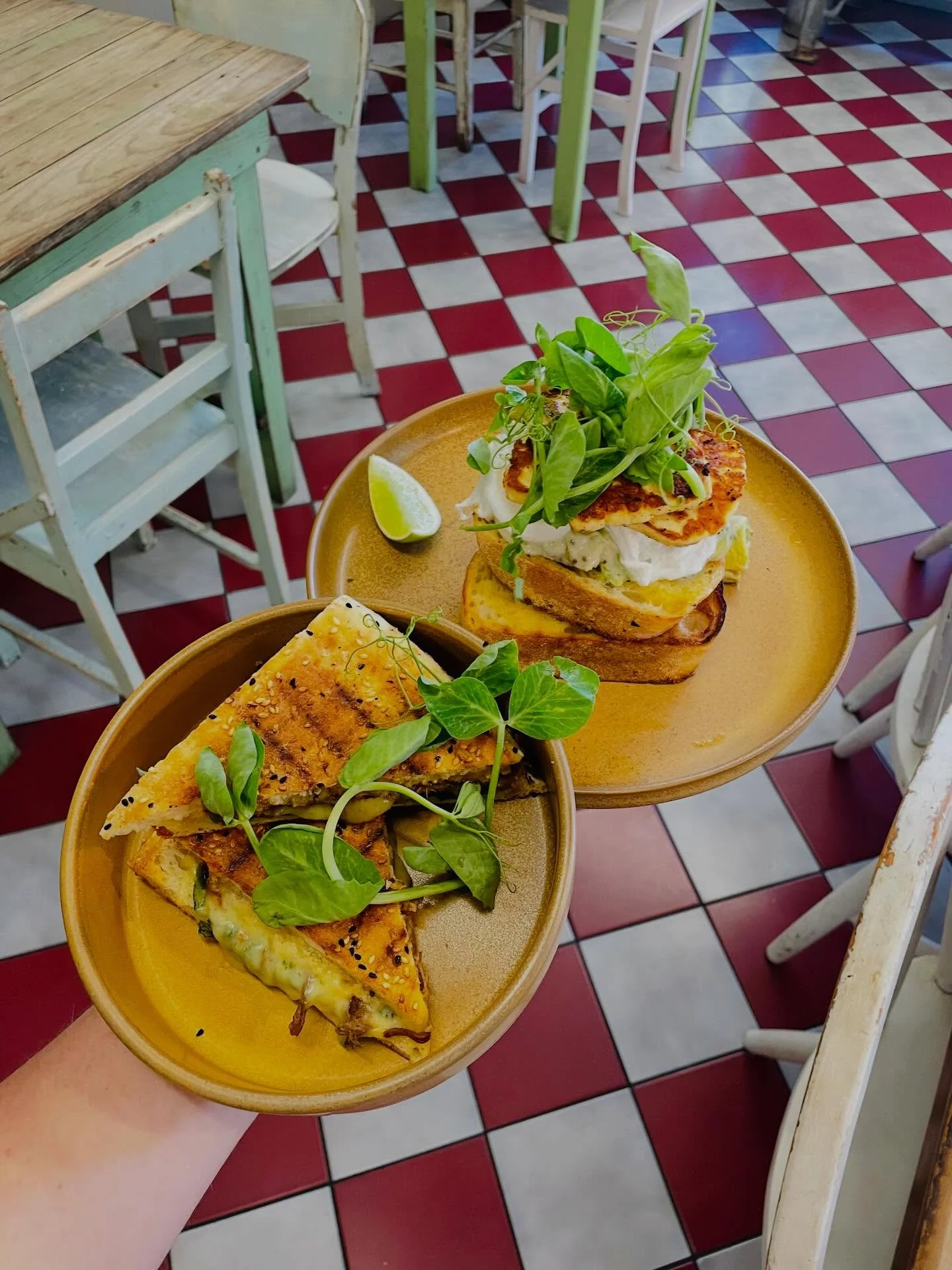 Breakfast served on the café's checkerboard tables